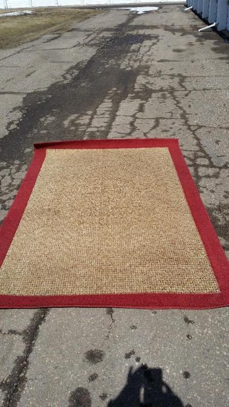 lot 20 image: Area Rug.Sand color body and red tr...