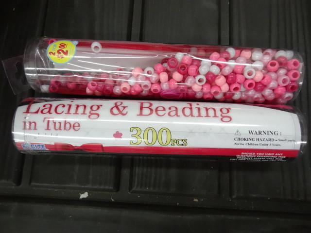 lot 72 image: Kids stuff lacing and beading in a ...