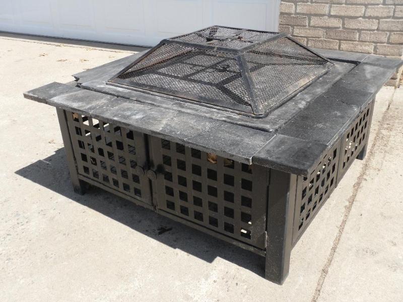 lot 46 image: Black Outdoor Firepit with Tile Sur...