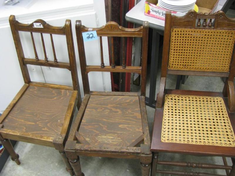 three vintage wooden chairs one wit...
