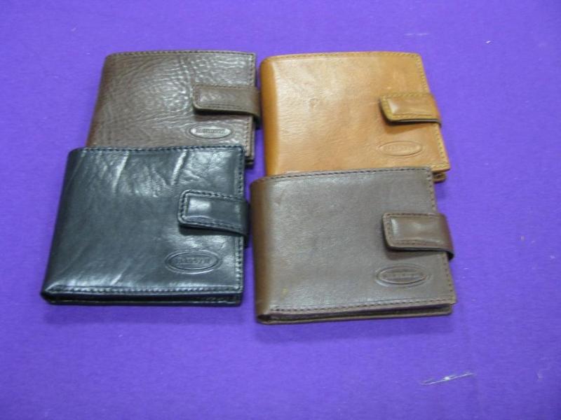 four Italian leather wallets new in...