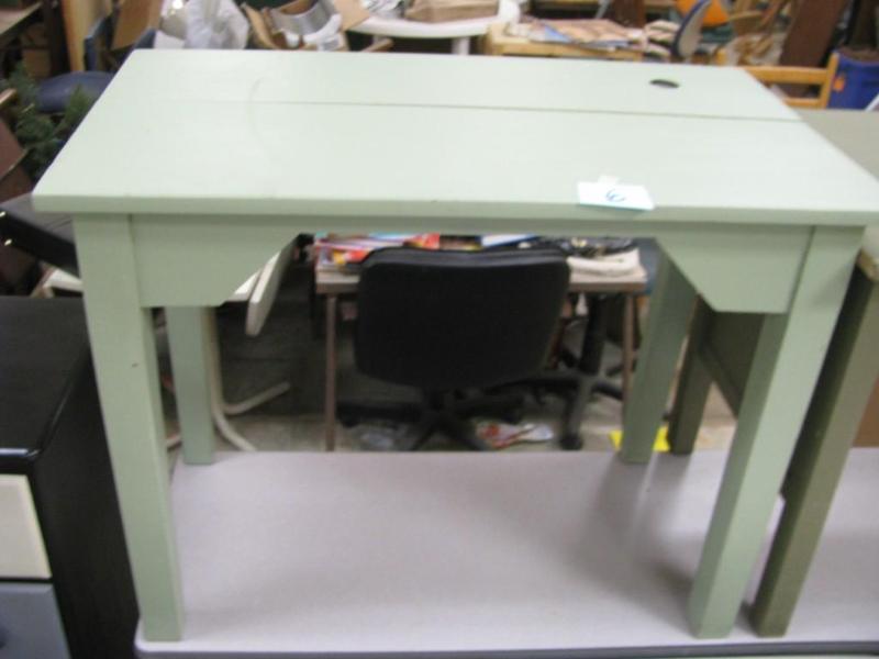 vintage library table has an ink we...