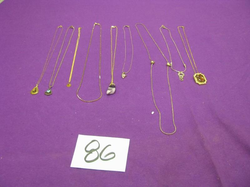 9 necklaces, gold tone...
