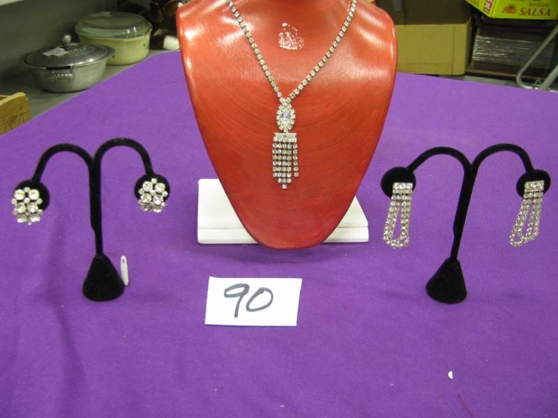 two pair of rhinestone earrings and...