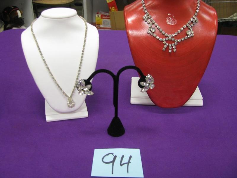 one pair of earrings and two rhines...