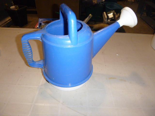 lot 239 image: Plant Waterer...