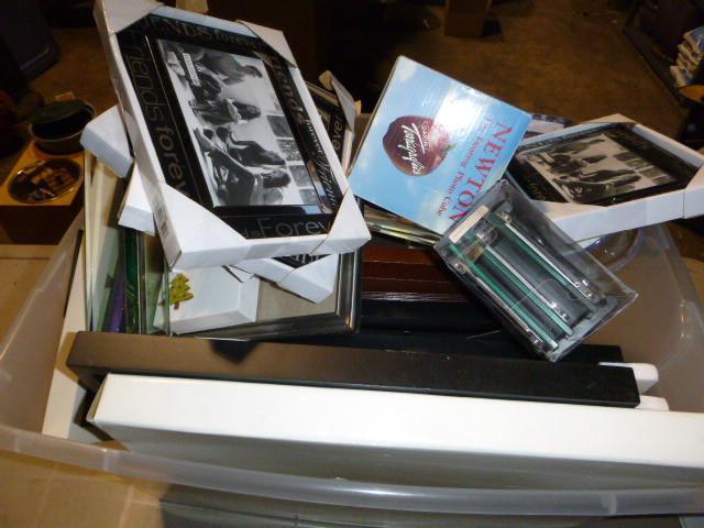 lot 319 image: Tote of Pictures Frames Most are Ne...