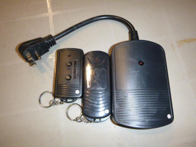 lot 53 image: Outlet Controller with 2 Remotes...