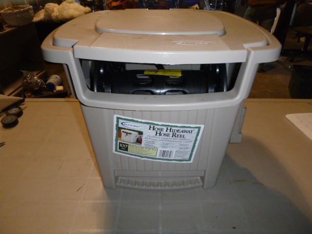 lot 71 image: Suncast Hose Hideaway Hose Reel 100...