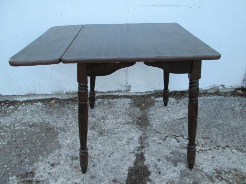 Drop leaf table, measures 29.5 x 28...