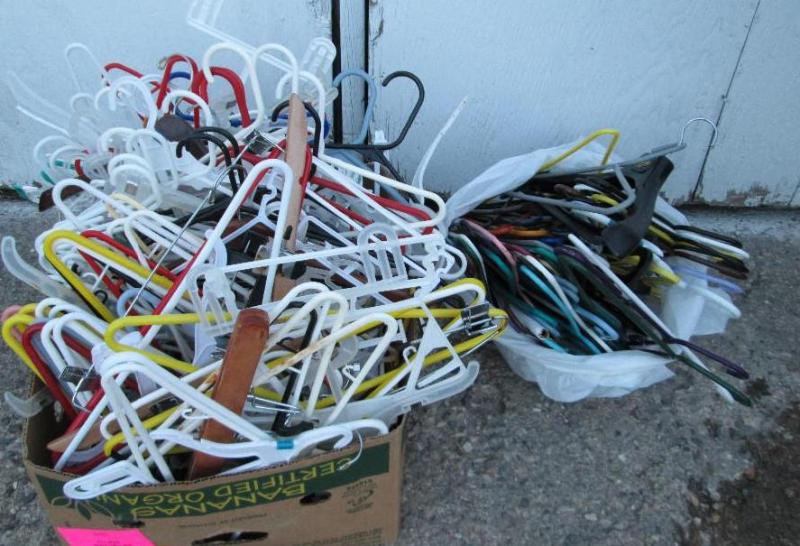 Box and bag of mainly plastic hange...
