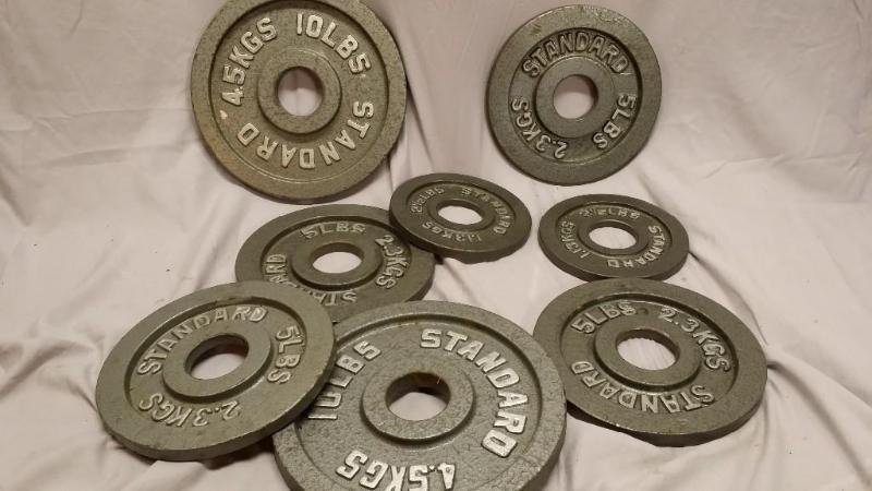 lot 25 image: Lot of Standard&nbspdumbell weight...