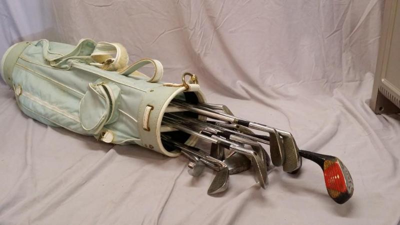 lot 29 image: This is a lot of golf clubs and bag...