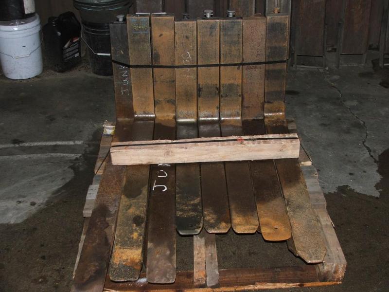 lot 19 image: A pallet of forklift forks. 7 pair ...
