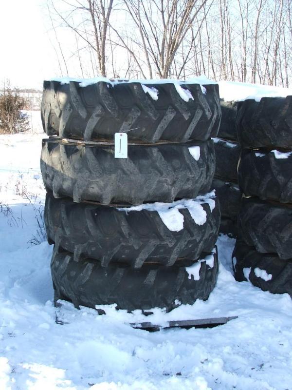 lot 25 image: A set of four 10 bolt rims and foam...