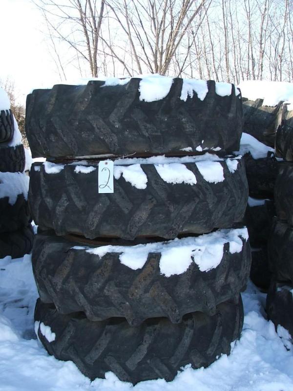 lot 26 image: set of four 10 bolt rims and foam f...