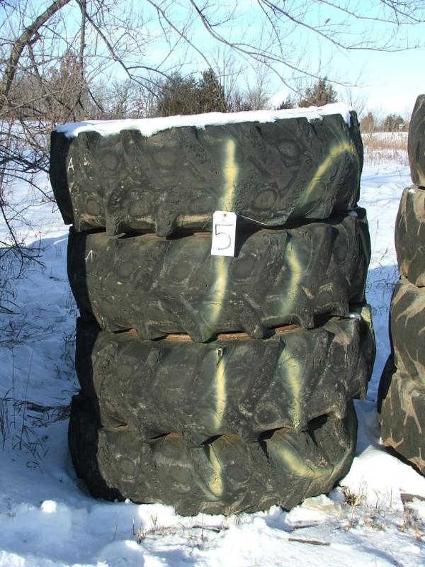 lot 29 image: A set of four 10 bolt rims and foam...