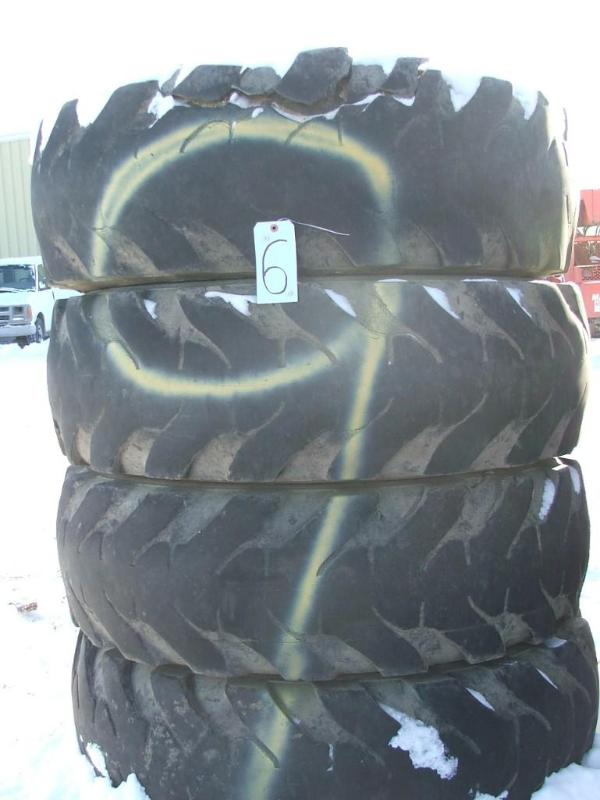 lot 30 image: A set of four 10 bolt rims and foam...