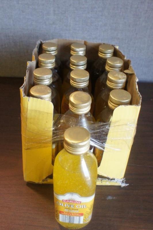 lot 50 image: Lot of (13) Carlini Olive Oil 100% ...