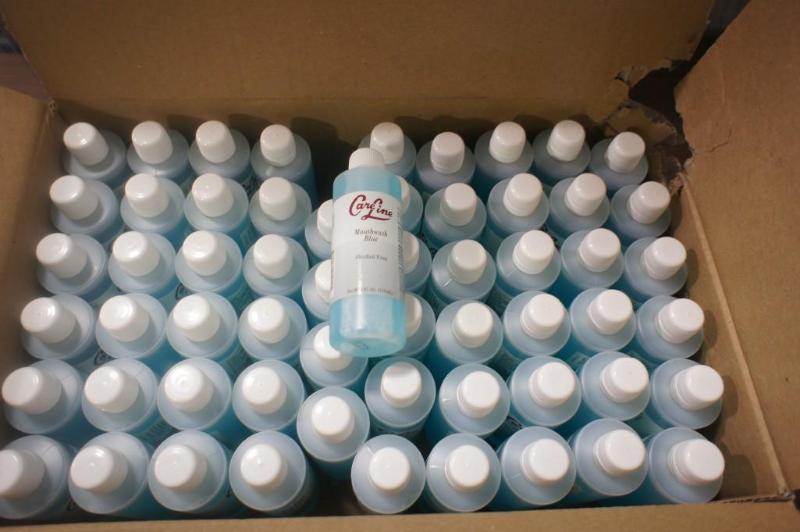 lot 77 image: Lot of (60) 4oz bottles of Careline...
