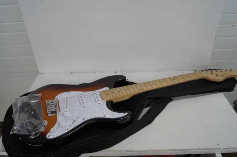Marigold electric guitar with case...