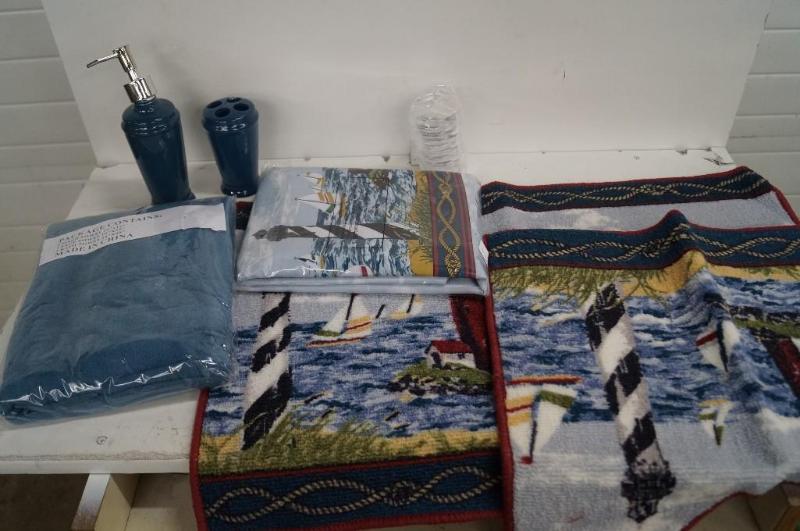 Bathroom rug, curtain, towel, and s...