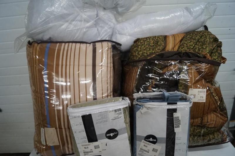 2 comforters, 3 pillows, and bed sh...