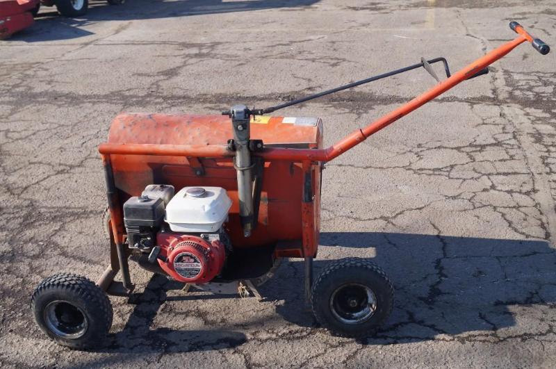 lot 7 image: Kwik-Trench Model KT1200, powered by a Honda GX140 gear reduction motor.