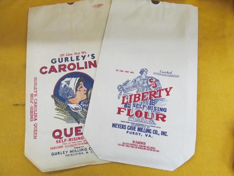 lot 12 image: 1 Paper Liberty Flour Bag and 1 Pap...
