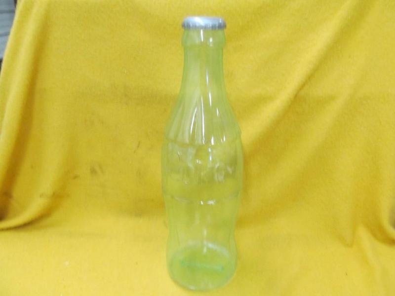 lot 181 image: Big Plastic Coke Bottle Coin Bank 2...