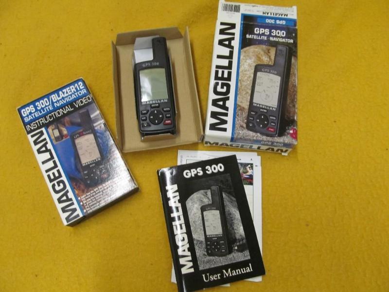 lot 194 image: Magellan GPS 300 Satellite Navigato...