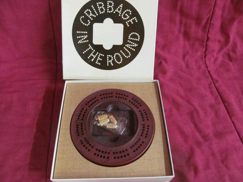 lot 245 image: Round Cribbage Board...