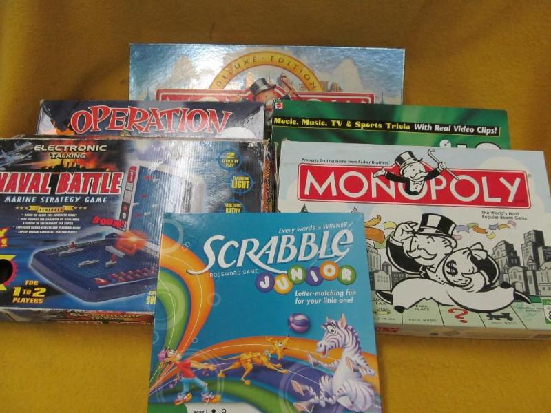 lot 75 image: Scrabble, 2 Monopoly, Scene It, Ope...