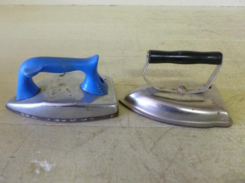 lot 160 image: Lot of two vintage metal toy irons,...
