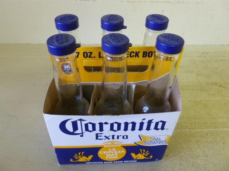 lot 85 image: Lot of six collectible Corona Extra...