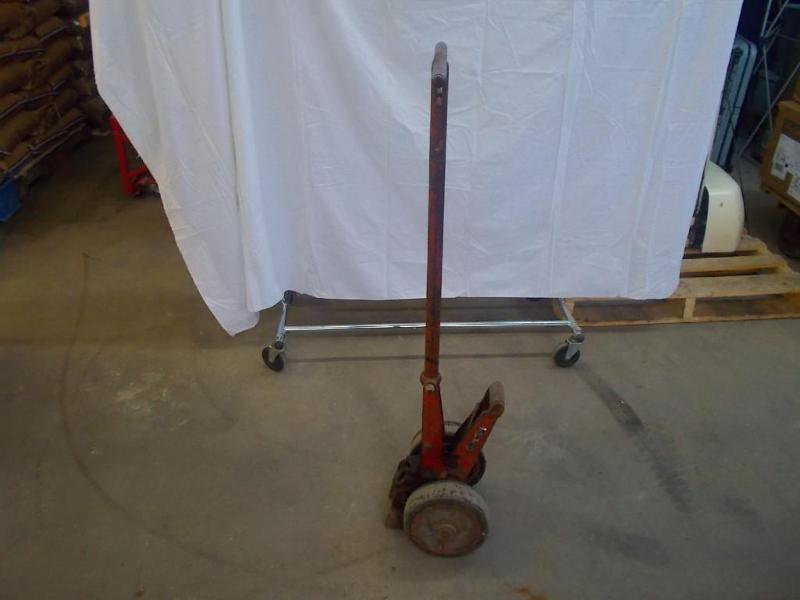 A 2 wheel dolly for moving Nutting ...