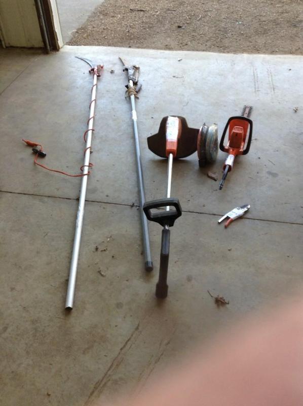 lot 104 image: 2 tree pole saws, 1 Black & Dec...