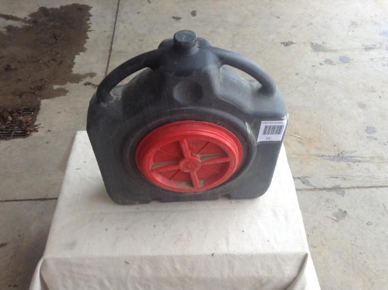lot 22 image: Very nice oil changing container by...