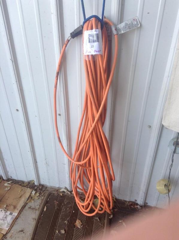 lot 23 image: 100 foot extension cord...
