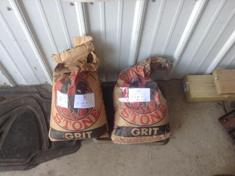 lot 31 image: Stone Grit 2 bags, 1 bag full, 1 ba...