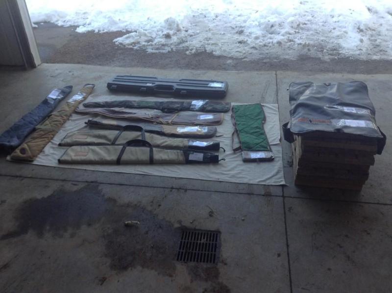 lot 34 image: Set of 9 gun cases and one tree sta...
