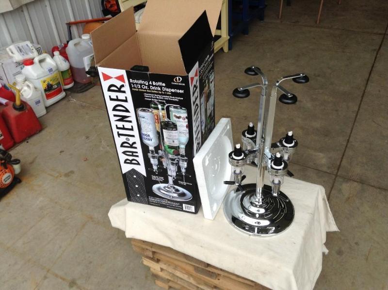lot 55 image: New open box rotating 4 bottle 1 &f...