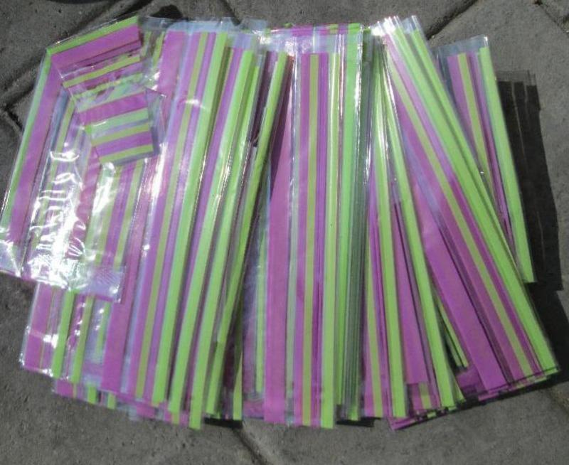 lot 3 image: Color striped plastic bag...