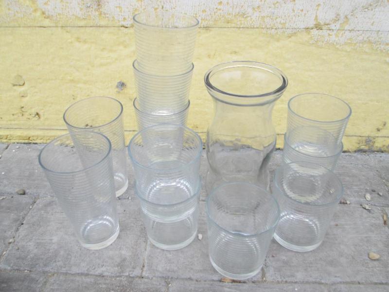 lot 43 image: Clear glasses and vase...