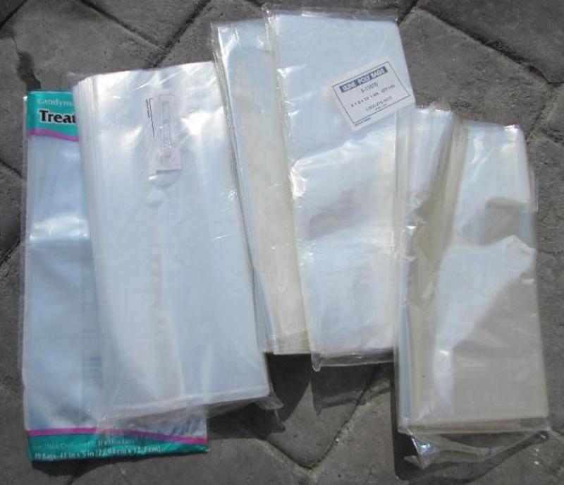 lot 65 image: Lot of bags including Uline poly ba...