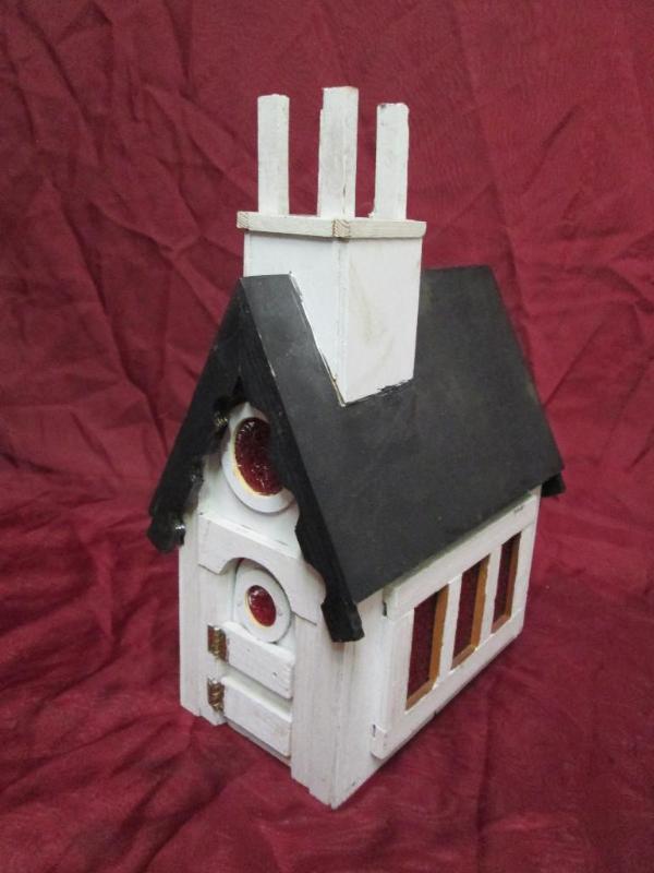 lot 107 image: Decorative light up church. Stands ...