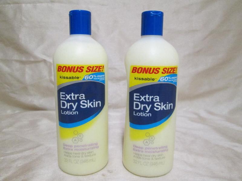 lot 125 image: Pair of 32 fl oz extra dry skin lot...