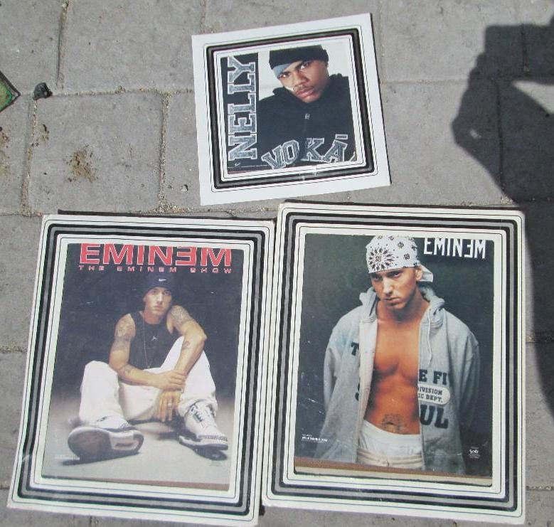 lot 183 image: Nelly and Eminem wall dcor...