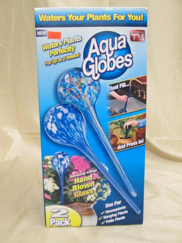 lot 211 image: Aqua globes blown glass automatic w...