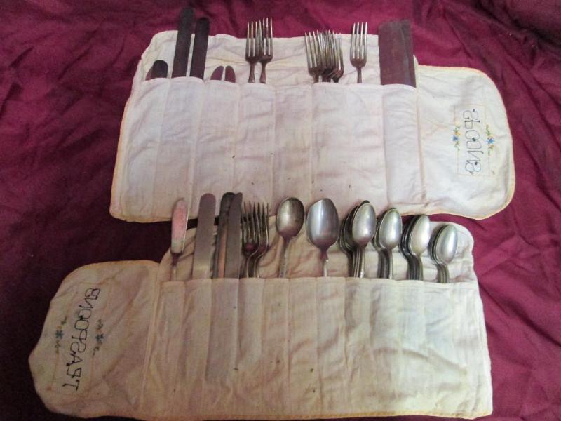 lot 24 image: Vintage silverware in custom pocket...